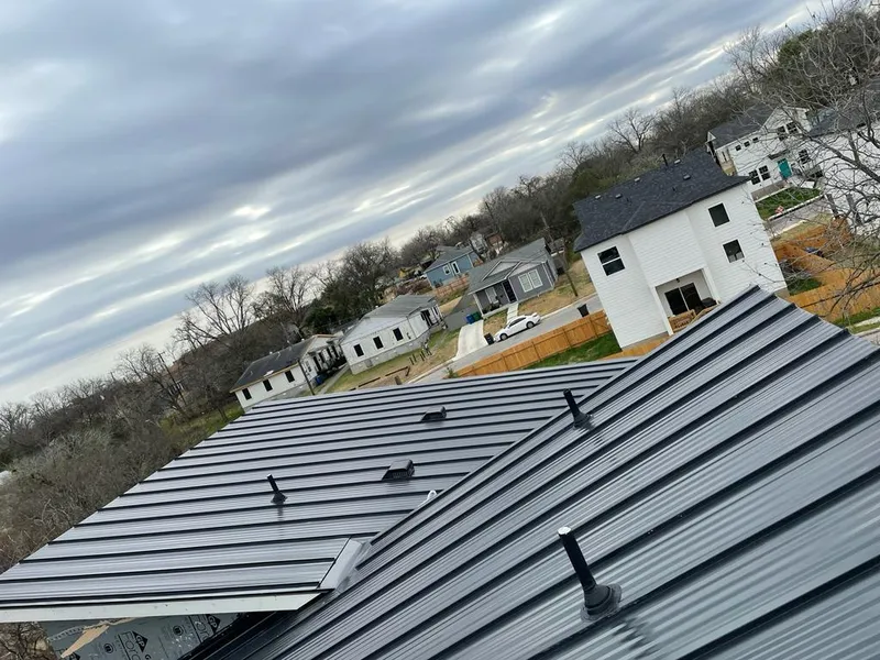 Standing seam metal roof panels with vents for Skylight Repair in Willard
